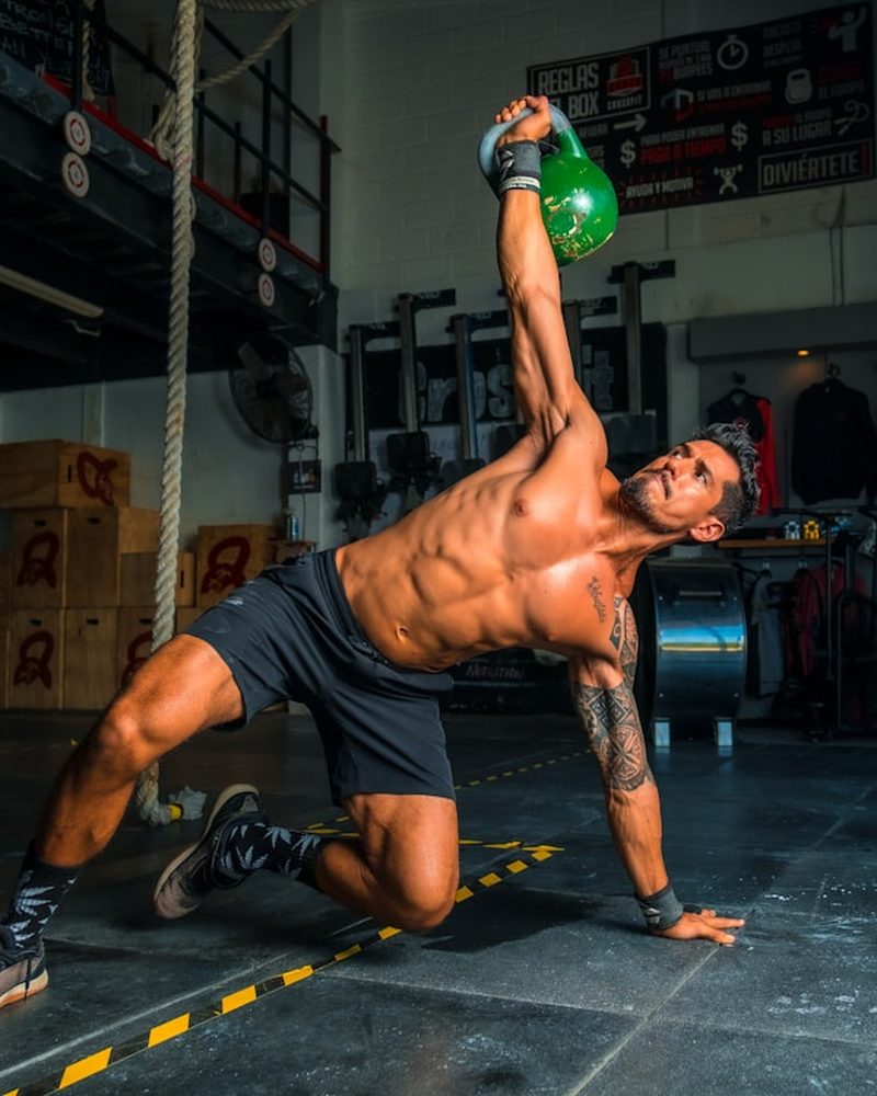 Man mid-workout in a gym